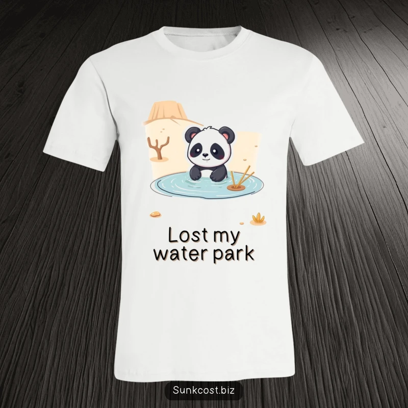 Funny t-shirt featuring a playful panda comically trying to swim in a dry desert, perfect for those with a quirky sense of humor.